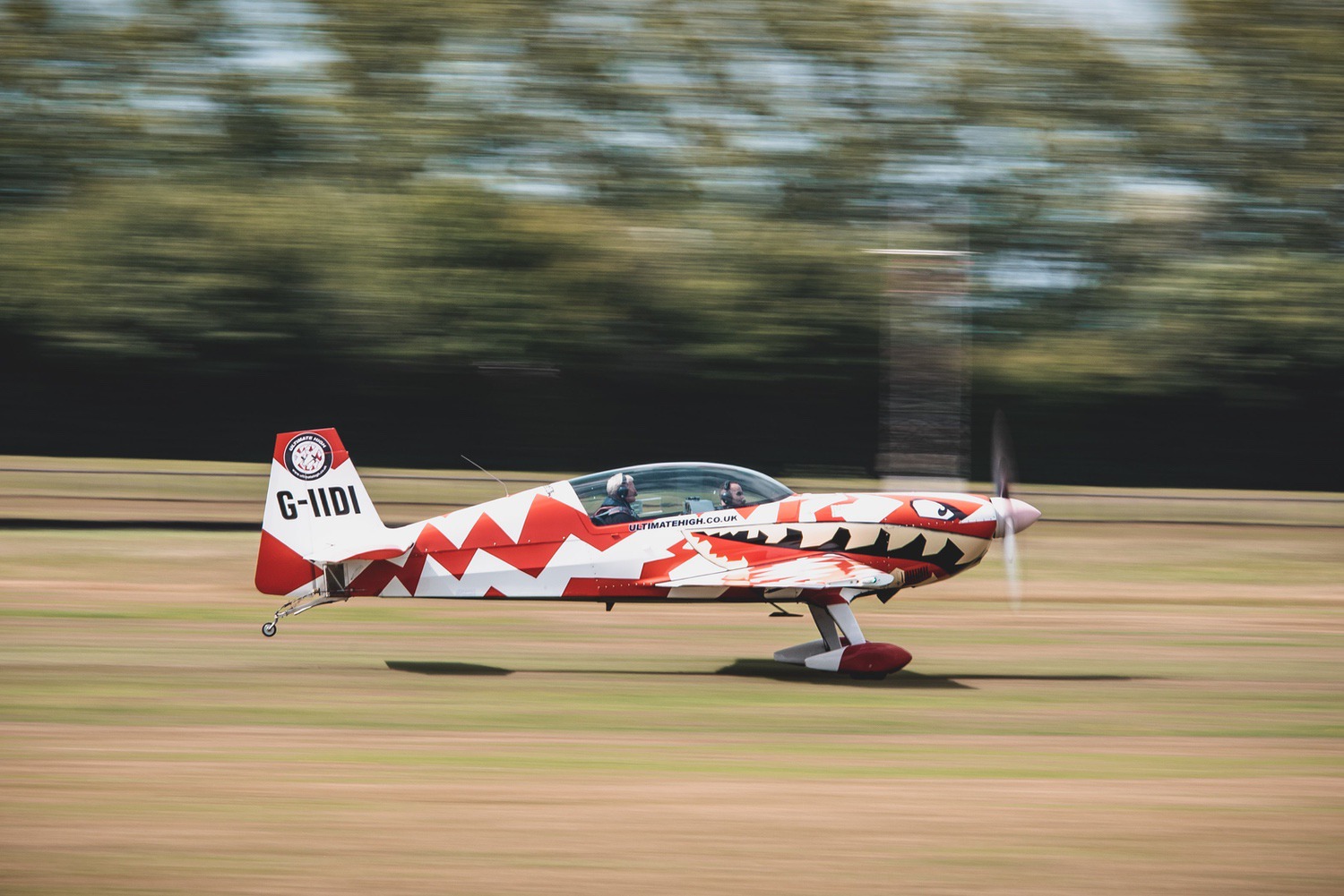 A stunt plane taking off