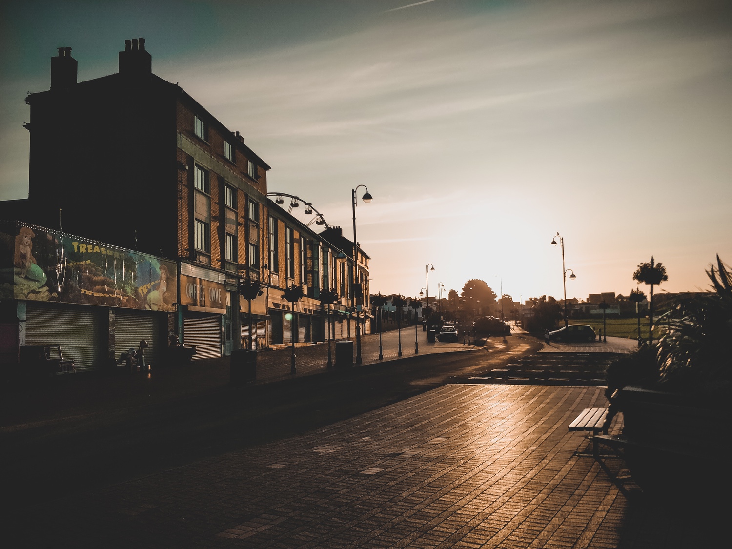 A row of amusment arcades in the morning sun