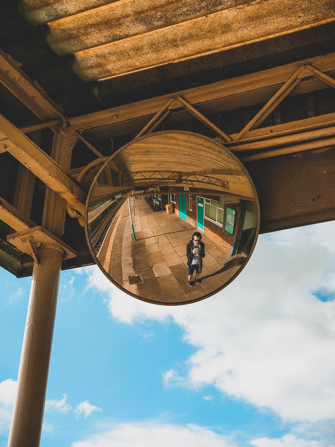 A selfie in a conic mirror at Barry station