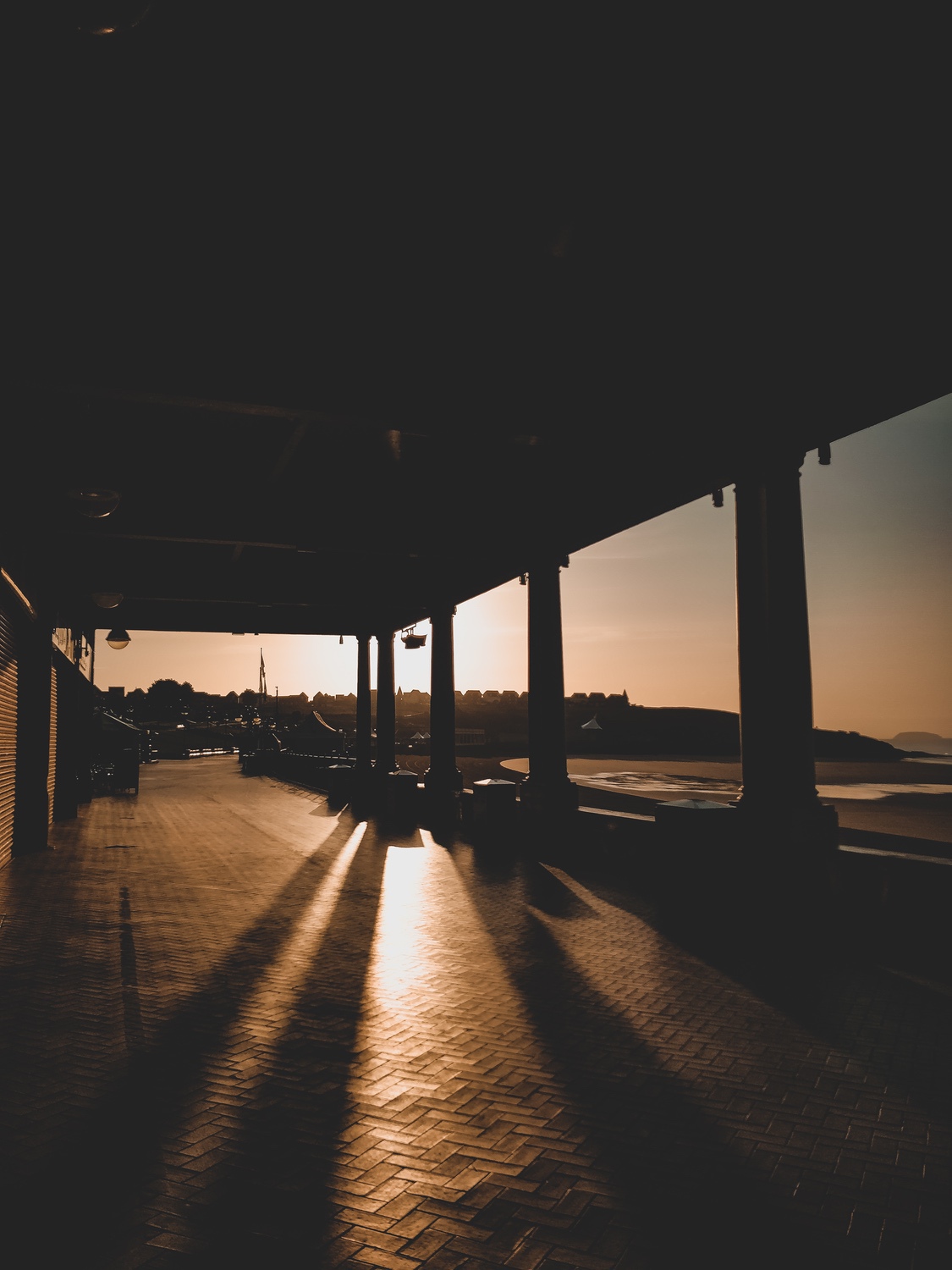 Long, lush shadows of the roman columns