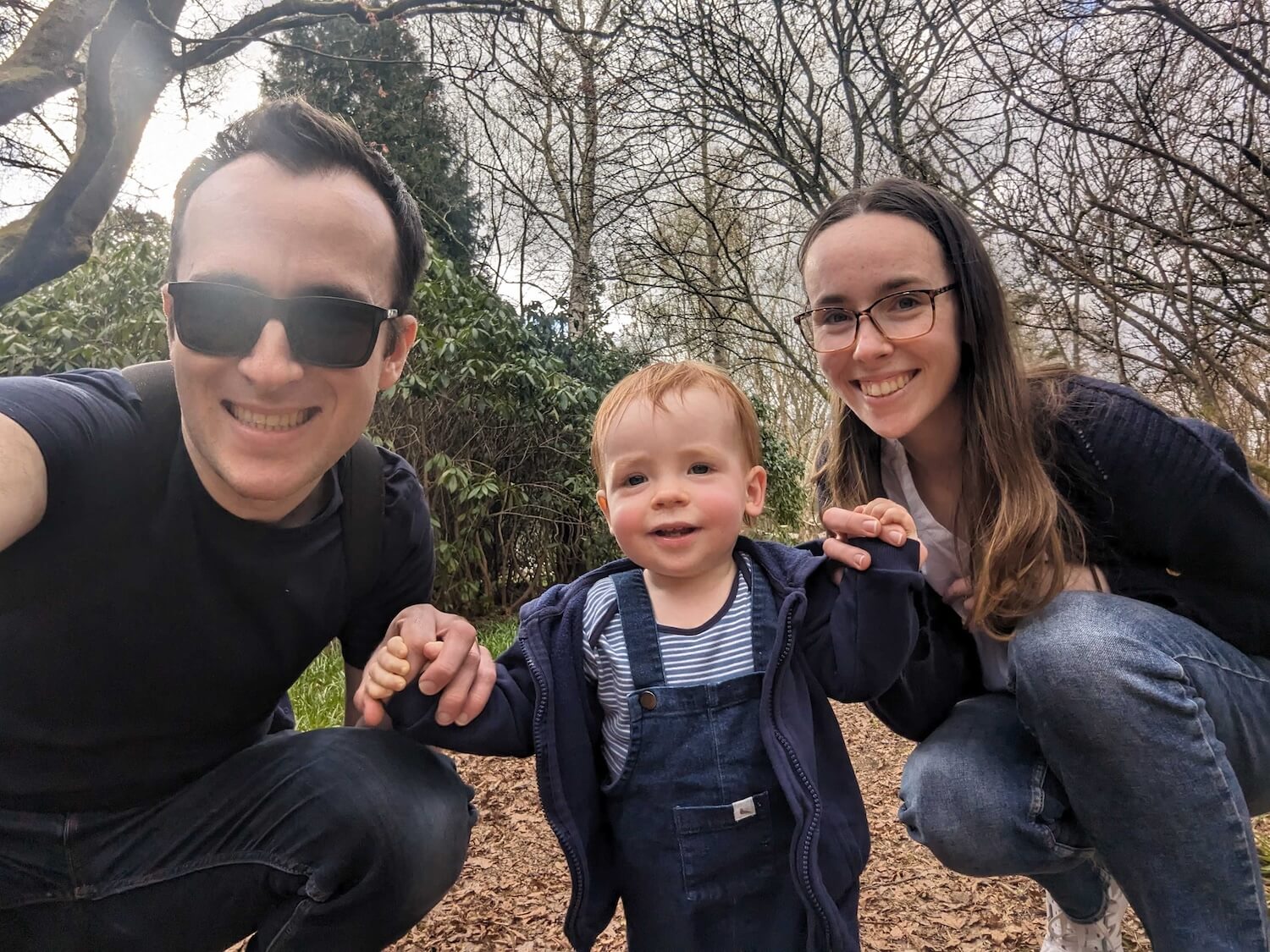 A selfie of me, Jacob and Lauren crouched/standing on a family walk in a local National Trust - we’re smiling at the camera.