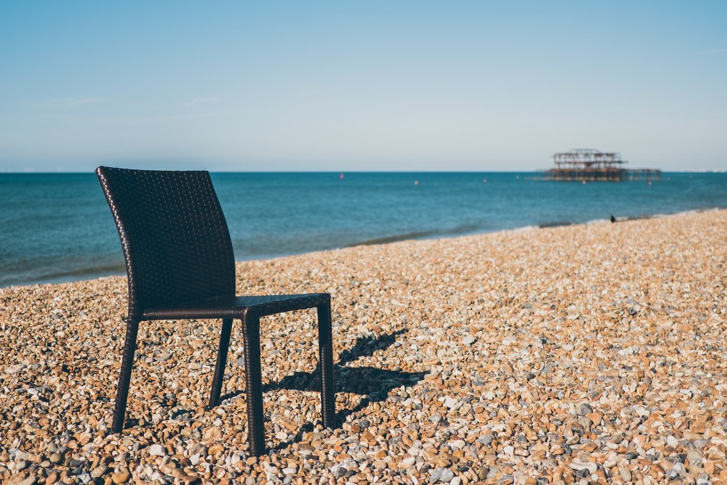 A stray chair left on Brighton beach